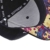 Nebelkind Snapback Cap schwarz Puzzlemuster kurzer Schirm onesize unisex - 